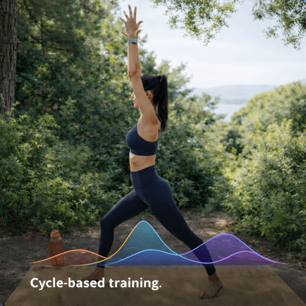 Athlete performing yoga with bioelectric wearable waveform visualization for performance monitoring